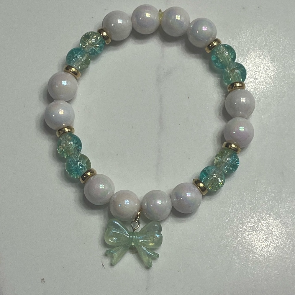 White and Teal Beaded Bracelet with Bow Charm